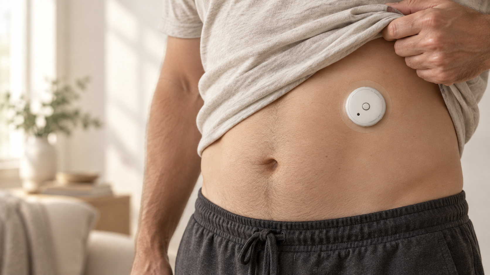 Illustrative placement of the compact wearable on the left upper abdomen